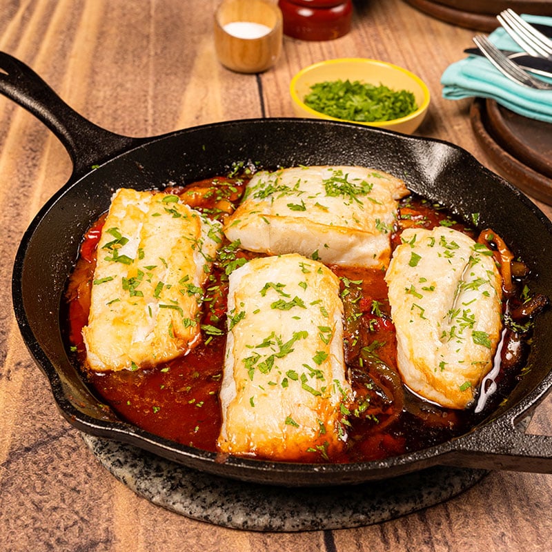 Grilled Norwegian salted cod with peppers