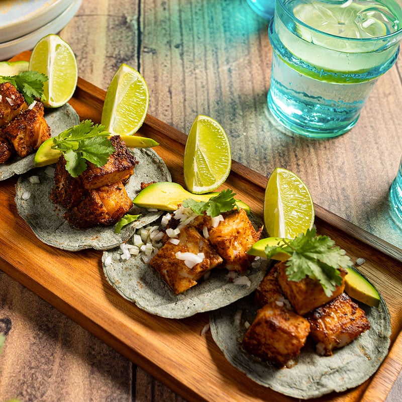 Tacos of Norwegian desalted cod marinated with avocado and coriander