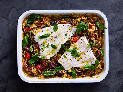 Baked Norwegian cod and cherry tomato orzo