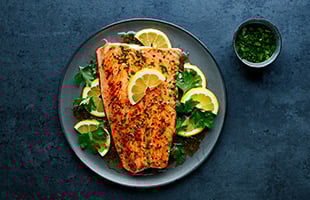 Grilled Norwegian fjord trout with lemon and herb marinade