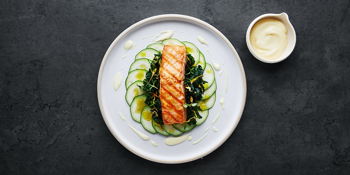 Grilled Norwegian salmon with kale and lemon hollandaise