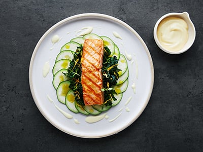 Grilled Norwegian salmon with kale and lemon hollandaise