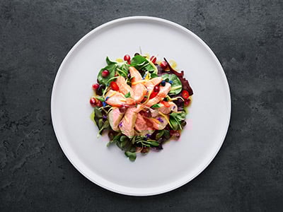 Norwegian salmon ceviche with mango and pomegranate