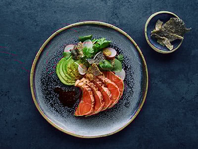Norwegian salmon tataki with puffed salmon skin