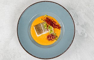 Norwegian skrei in a creamy pickled sauce