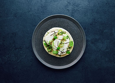 Baked skrei with potatoes, leek and truffle