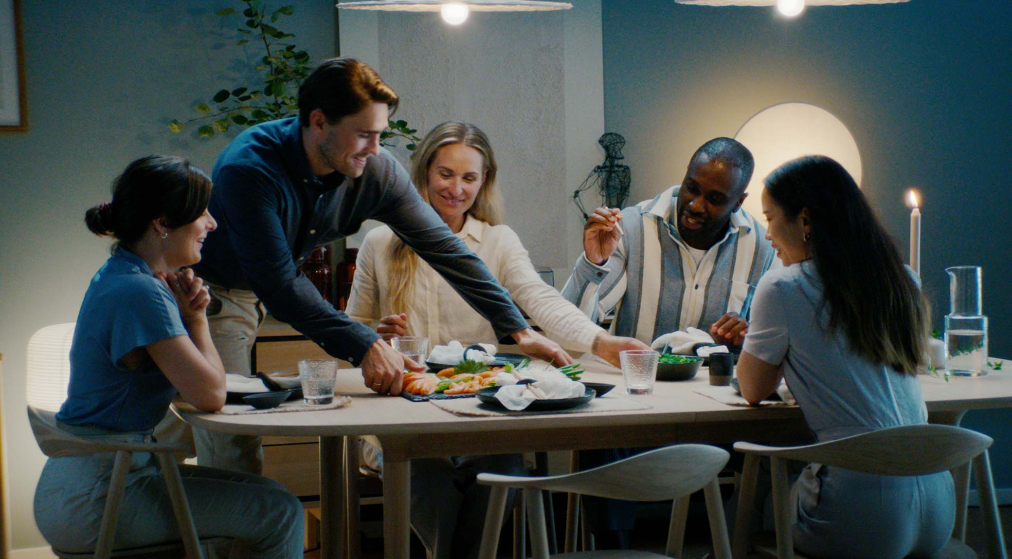 People sitting around the dinner table